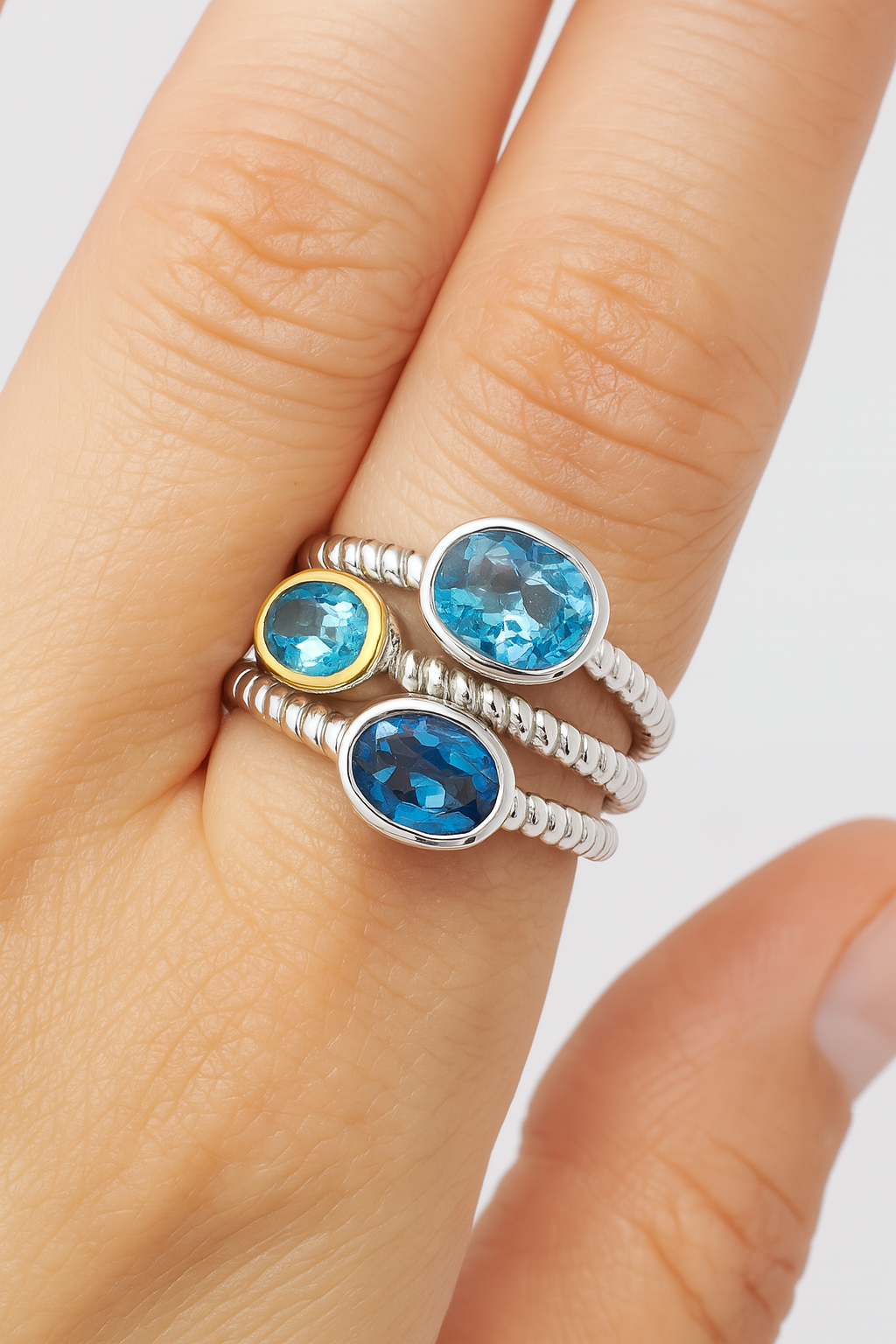 Three-Stone Blue Topaz Ring – Sterling Silver & 14K Yellow Gold