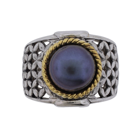 Sterling silver wide band ring with 10mm black freshwater pearl centered in gold-plated rope bezel and textured quatrefoil pattern sides